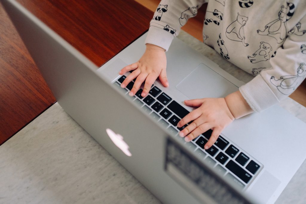 Baby Working on a Laptop